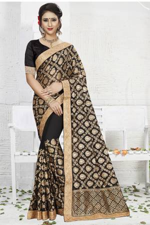 For A Bold And Beautiful Look, Grab This Designer Heavy Saree In Black Color .This Saree Is Georgette Based Beautified With Heavy Embroidery Work Paired With Art Silk Fabricated Blouse. Buy This Saree Now.