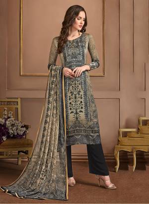 Simple And Elegant Looking Designer Straight Suit In Here In Grey And Beige Color. Its Top Is Fabricated On Satin Georgette Paired With Crepe Bottom And Georgette Fabricated Dupatta. All Its Fabrics Are Soft Towards Skin And Easy To Carry all Day Long. 