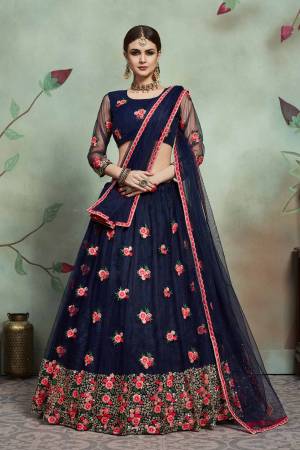 Enhance Your Personality Wearing This Beautiful Designer Lehenga Choli In Navy Blue Color. It Is All Over Fabricated On Soft Net Beautified With Contrasting Thread Work And Sequence. Buy This Pretty Piece Now. 