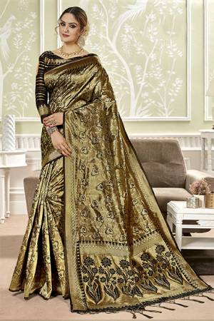 For A Bold And Beautiful Look, Grab This Designer Silk Based Saree In Black. This Saree And Blouse are Fabricated On Banarasi Art Silk Beautified With Weave All Over. 