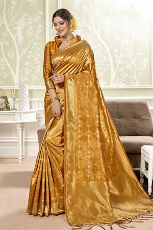 For A Proper Traditional Look, Grab This Silk Based Saree In Musturd Yellow Color. This Saree And Blouse Are Fabricated On Banarasi Art Silk Beautified With Small Motif Weave All Over?