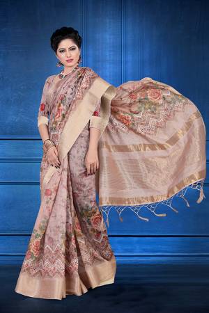 Here Is A Rich And Elegant Looking Designer Silk Based Saree. This Pretty Saree and Blouse Are Fabricated On Jacquard Silk Beautified With Digital Prints All Over. It Is Light In Weight And Easy To Carry All Day Long. 