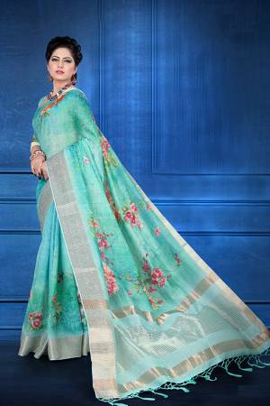 Here Is A Rich And Elegant Looking Designer Silk Based Saree. This Pretty Saree and Blouse Are Fabricated On Jacquard Silk Beautified With Digital Prints All Over. It Is Light In Weight And Easy To Carry All Day Long. 