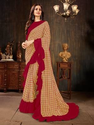 Celebrate This Festive Season With This Treding Ruffle Saree In Beige Color Paired With Red Colored Blouse. This Saree And Blouse Are Silk Based Beautified With Checks Prints And Ruffle Border. Buy Now.
