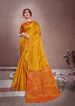 Adorn A Proper Traditional Look Wearing This Designer Silk Based Saree In Musturd Yellow Color. This Pretty Saree And Blouse Are Fabricated On Banarasi Art Silk Beautified With Weave All Over. 