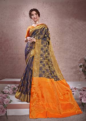 Celebrate This Festive Season With Beauty And Comfort Wearing This Designer Saree In Navy Blue Color Paired With Contrasting Orange Colored Blouse. This Saree And Blouse Are Fabricated On Banarasi Art Silk Beautified With Weave All Over. It Is Light Weight And Easy To Drape. 