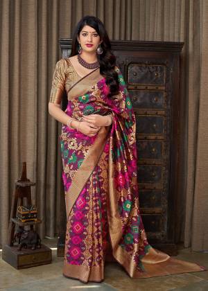 Grab This Pretty Designer Silk Based Saree In Purple Color Paired With Golden Colored Blouse. This Saree And Blouse Are Fabricated On Banarasi Art Silk Beautified With Weave All Over. 