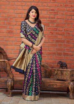 Silk Based Saree For This Season Is A Must In Every Womens Wardrobe. Grab This Designer Saree In Navy Blue Color Fabricated On Banarasi Art Silk. It Is Beautified With Attractive Weave All Over. Buy Now.