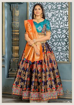 Get Ready For The Upcoming Festive Season On Navratri With This Designer Silk Based Lehenga Choli. This Embroidered And Heavy Weaved Lehenga Choli And Dupatta Are Fabricated On Banarasi Art Silk Which Also Gives A Rich Look To Your Personality. 