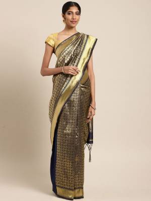 Silk Saree Always Gives A Rich And Elegant Look To Your Personality. Grab This Deisgner Silk Based Saree In Black Color Beautified With Heavy Weave All Over. This Saree And Blouse Are Fabricated On Art Silk. Buy Now.