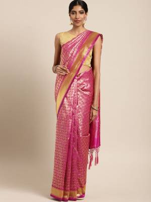 Silk Saree Always Gives A Rich And Elegant Look To Your Personality. Grab This Deisgner Silk Based Saree In Pink Color Beautified With Heavy Weave All Over. This Saree And Blouse Are Fabricated On Art Silk. Buy Now.