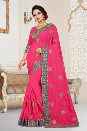 Grab This Beautiful Heavy Designer Saree In Dark Pink Color Paired With Dark Pink Colored Blouse. This Saree And Blouse are Fabricated On Georgette Beautified With Jari And Tone To Tone Resham Embroidery With Stone Work.  Buy This Saree Now. 