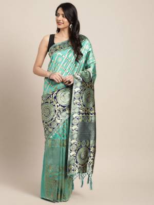 Silk Saree Always Gives A Rich And Elegant Look To Your Personality. Grab This Deisgner Silk Based Saree In Sea Green Color Beautified With Heavy Weave All Over. This Saree And Blouse Are Fabricated On Art Silk. Buy Now.