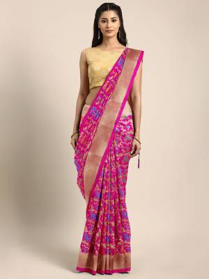 Celebrate This Festive Season In Traditional Look Wearing This Silk Based Saree In Rani Pink Color. This Saree And Blouse are Fabricated On Art Silk Beautified With Weave All Over. 