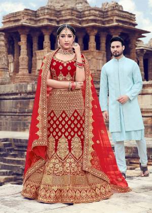 Get Ready For Your D-Day With This Heavy Designer Bridal Lehenga Choli In All Over Red Color. Its Heavy Embroidered Blouse And Lehenga Are Fabricated On Velvet Paired With Net Fabricated Dupatta. It Is Beautified With Heavy Jari Embroidery And Stone Work. Buy Now.
