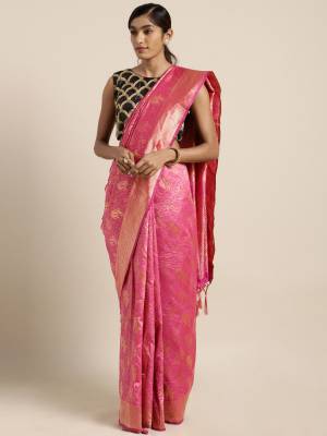 Grab This Pretty Silk Based Saree With Heavy Weave In Pink Color Paired With Black Colored Blouse. This Saree and blouse are Blouse Fabricated On Tanchoi Art Silk Beautified With Weave All Over. It Is Light Weight And Easy To Carry All Day Long.