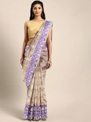 Silk Saree Always Gives A Rich And Elegant Look To Your Personality. Grab This Deisgner Silk Based Saree In Grey Color Beautified With Heavy Weave All Over. This Saree And Blouse Are Fabricated On Kanjivaram Art Silk. Buy Now.