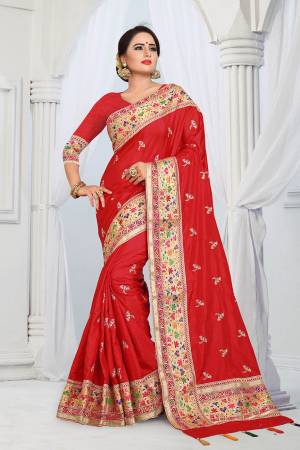 Here Is A Very Pretty Designer Silk Based Saree In Red Color . This Saree And Blouse Are Fabricated On Soft Art Silk Beautified With Multi Colored Thread Work Over The Boder And Small Butti Work Over The Saree. Its Rich Fabric Gives An Enhanced Look To Your Personality And Also It Is Durable And Easy To Care For. 