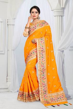 Here Is A Very Pretty Designer Silk Based Saree In Musturd Yellow Color . This Saree And Blouse Are Fabricated On Soft Art Silk Beautified With Multi Colored Thread Work Over The Boder And Small Butti Work Over The Saree. Its Rich Fabric Gives An Enhanced Look To Your Personality And Also It Is Durable And Easy To Care For. 