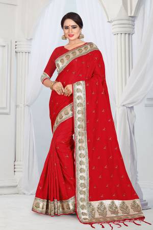 Evergreen Patterned Designer Saree Is Here For All Occasion Wear. This Attractive Looking Red Colored Saree And Blouse Are Fabricated On Soft Art Silk Beautified With Heavy Embroidered Lace Border. This Saree Is Light Weight And Easy To Carry All Day Long. 
