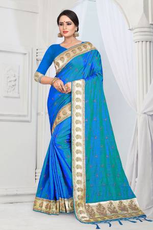 Evergreen Patterned Designer Saree Is Here For All Occasion Wear. This Attractive Looking Blue Colored Saree And Blouse Are Fabricated On Soft Art Silk Beautified With Heavy Embroidered Lace Border. This Saree Is Light Weight And Easy To Carry All Day Long. 
