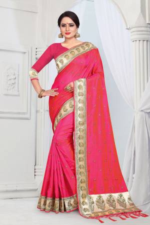 Evergreen Patterned Designer Saree Is Here For All Occasion Wear. This Attractive Looking Fuschia Pink Colored Saree And Blouse Are Fabricated On Soft Art Silk Beautified With Heavy Embroidered Lace Border. This Saree Is Light Weight And Easy To Carry All Day Long. 