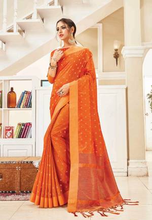 Celebrate This Festive Season With Beauty And Comfort In This Elegant Looking Designer Silk Based Saree In Orange Color. This Saree And Blouse Are Fabricated On Art Silk Beautified With Small Butti Weave All Over. Buy Now.