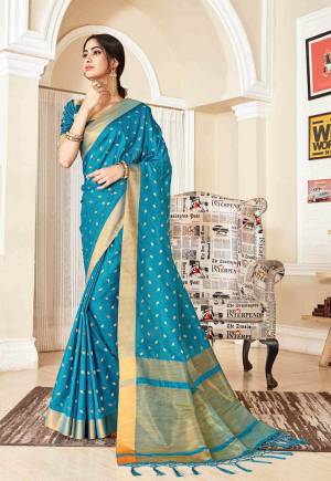 Flaunt Your Rich And Elegant Taste In Silk With This Subtle Weaved Saree In Blue Color. This Saree And Blouse Are Fabricated On Art Silk Beautified With Pretty Small Butti Weave All Over It. Its Silk Based Fabric Will Give A Rich Look To Your Personality.