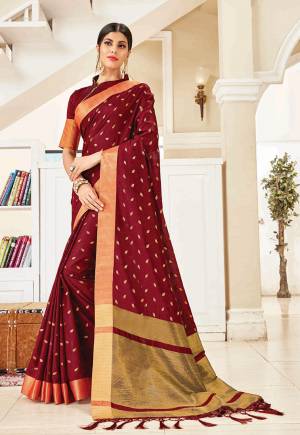Celebrate This Festive Season With Beauty And Comfort In This Elegant Looking Designer Silk Based Saree In Maroon Color. This Saree And Blouse Are Fabricated On Art Silk Beautified With Small Butti Weave All Over. Buy Now.