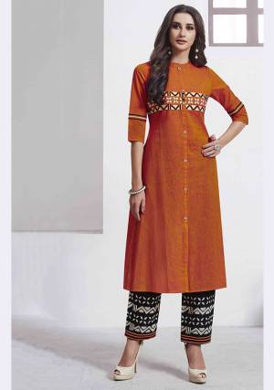 Celebrate This Festive Season With Beauty And Comfort Wearing This Readymade Pair Of Kurti And Pant In Orange And Black Color. This Pretty Pair Is Fabricated On Cotton Which Is Soft Towards Skin And Easy To Carry All Day Long.