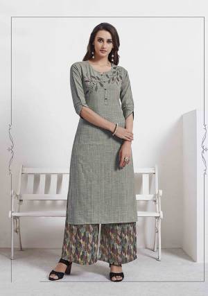 Rich And Elegant Looking Readymade Kurti Is Here In Grey Color Paired With Multi Colored Bottom. This Kurti IS Fabricated On Cotton Beautified With Thread Work Paired With Rayon Fabricated Printed Bottom. 