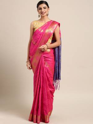Celebrate This Festive Season In Traditional Look Wearing This Silk Based Saree In Dark Pink Color. This Saree And Blouse are Fabricated On Kanjivaram Art Silk Beautified With Weave All Over