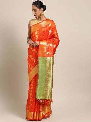 Silk Saree Always Gives A Rich And Elegant Look To Your Personality. Grab This Deisgner Silk Based Saree In Orange Color Beautified With Heavy Weave All Over. This Saree And Blouse Are Fabricated On Kanjivaram Art Silk. Buy Now