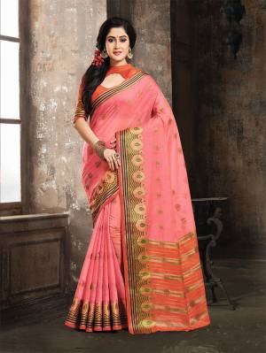 Look Pretty In This Pink Colored Weaved Saree Paired With Contrasting Orange Colored Blouse. This Saree And Blouse Are Fabricated On Art Silk Beautified With Beautified With Weave All Over. 