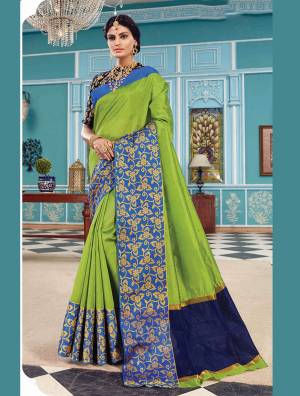 Look Pretty In This Purple Colored Weaved Saree Paired With Contrasting Dark Green Colored Blouse. This Saree And Blouse Are Fabricated On Art Silk Beautified With Beautified With Weave All Over. 