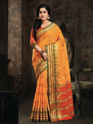 Celebrate This Festive Season With A Proper Traditional Look Wearing This Silk Based Saree In Orange Color. This Saree And Blouse Are Fabricated On Art Silk Beautified With Weave. 