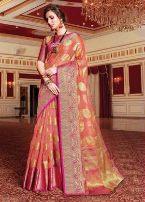 Adorn A Proper Traditional Look Wearing This Designer Silk Based?Saree In Peach Color. This Pretty Saree And Blouse Are Fabricated On Handloom Art Silk Beautified With Weave All Over.