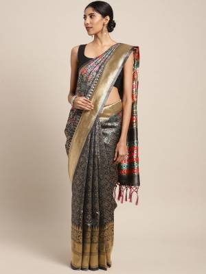 Celebrate This Festive Season In Traditional Look Wearing This Silk?Based Saree In Dark Grey Color. This Saree And Blouse are Fabricated On Banarasi Art Silk Beautified With Weave All Over