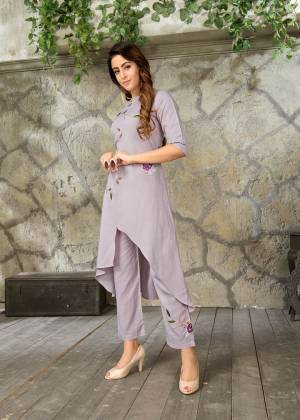 Simple and Elegant Looking Readymade Pair Of Kurti And pant Is Here In Grey Color. Its Top and Bottom are Fabricated On Rayon Which Is Soft Towards Skin And Easy To Carry All Day Long. 