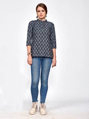 For Your College, Home Or Work Place, Grab This Designer Readymade Top In Black Color Beautified With Small Prints All Over It. It Is Light In Weight And Easy To Carry All Day Long. 