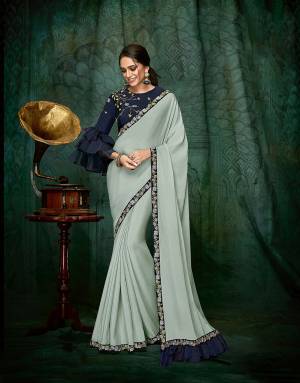 Pastels and extravagant sleeves with a perfect touch of hand-karigari and frill details with take you straight into the world of style. This trend -infused saree will look best when Paired with modern fine jewelry.