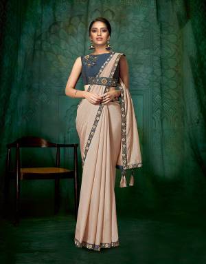Subtle Pastel pink saree with a semi-belted handwork blouse for a more manageable pallu is all about giving the regular saree an urban renewal. 