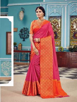 Here Is A Pretty Silk Based Saree In Same Family Color Saree And Blouse. This Pretty Saree Is In Rani Pink Color Paired With Orange Colored Blouse. It Is Beautified With Weave Over The Broad Saree Border Giving It An Attractive Look. 