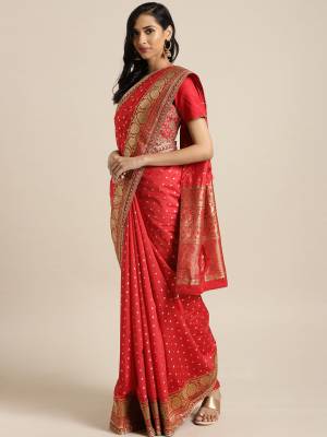 Grab This Beautiful Designer Saree In Red Color Paired With Red Colored Blouse. This Pretty Saree And Blouse are Fabricated On Art Silk Highlited With Jacquard Silk Pallu. Its Blouse Is Beautified With Heavy Embroidery And Weave Over The Saree. 