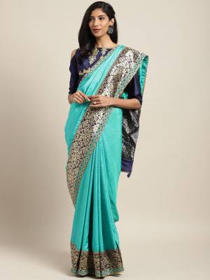 Look Pretty In This Designer Silk Based Saree In Sky Blue Color Paired With Navy Blue Colored Blouse. This Pretty Weaved And Embroidered Saree Is Beautified With Jacquard Silk Fabricated Pallu. Buy This Pretty Saree Now.