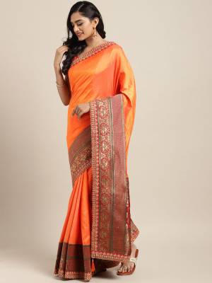 Bright And Visually Appealing Color IS Here With This Designer Saree In Orange Color Paired With Contrasting Red Colored Blouse. This Saree And Blouse Are Fabricated On Art Silk Beautified With Weave And Embroidery. Its Attractive Part Is Its Jacquard Silk Fabricated Pallu. 