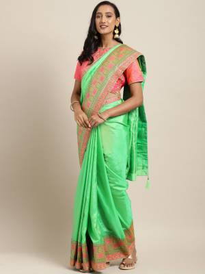 Bright And Visually Appealing Color IS Here With This Designer Saree In Neon Green Color Paired With Contrasting Fuschia Pink Colored Blouse. This Saree And Blouse Are Fabricated On Art Silk Beautified With Weave And Embroidery. Its Attractive Part Is Its Jacquard Silk Fabricated Pallu. 