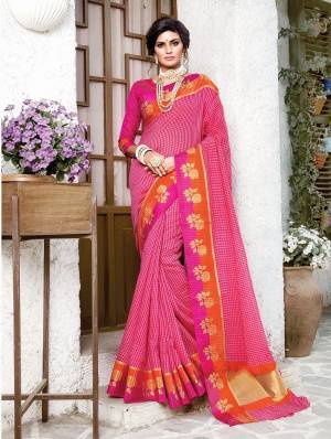 For A Proper Traditional Look, Grab This Designer Silk Based Saree In Dark Pink. It Is Beautified With Checks Prints All Over With Weaved Lace Border. Buy Now.