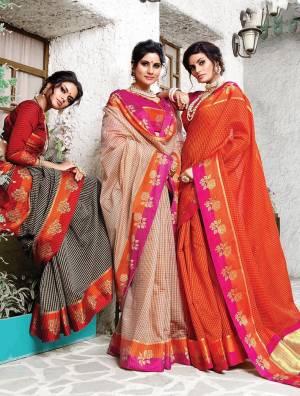 Celebrate This Festive Season Wearing Designer Silk Based Saree In Beige Color Paired With Contrasting Dark Pink Colored Blouse. It Has Very Pretty Checks Prints All Over With Weave Lace Border. Its Attractive Color Pallete And Fabric Will Earn You Lots Of Compliments From Onlookers. 