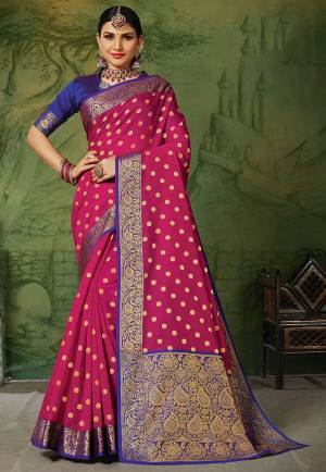 Flaunt Your Rich And Elegant Taste In Silk With This Subtle Weaved Saree In Magenta Pink Color. This Saree And Blouse Are Fabricated On Art Silk Beautified With Pretty Small Butti Weave All Over It. Its Silk Based Fabric Will Give A Rich Look To Your Personality